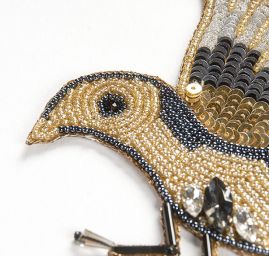 Zvířecí aplikace ptáček s krystaly