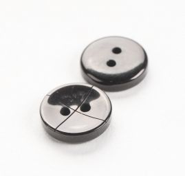 Knoflík plastový kulatý dvojdírkový 22" černý