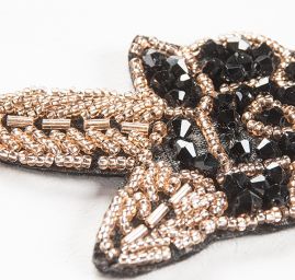 Korálková aplikace květinový motiv zlatá/černá