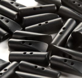 Knoflík plastový oliva černý 35x10 mm