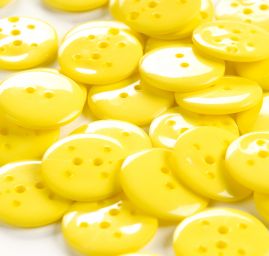 Knoflík plastový kulatý žlutý 30"
