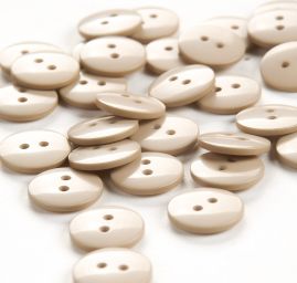 Knoflík plastový kulatý  béžový 24"