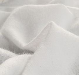 Netkaná textilie nažehlovací elastiká 150 cm bílá