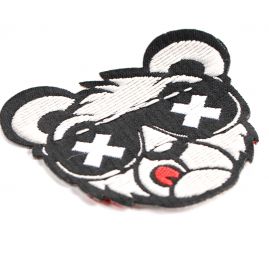 Nažehlovačka medvěd s brýlemi