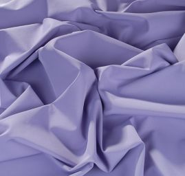 Pružná kostýmová látka levanduľovej farby
