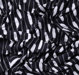 Efektní úplet plastický vzor černobílý