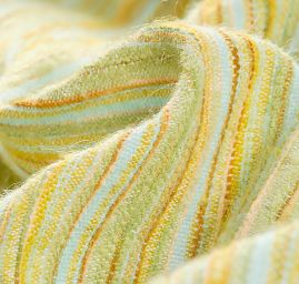 Kostýmová žakárová látka vlna směs pastel zelená