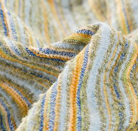 Kostýmová látka buklé vlna směs zelený melír