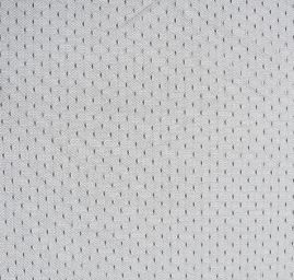 Efektní tyl s vyšitými punítky v černé barvě