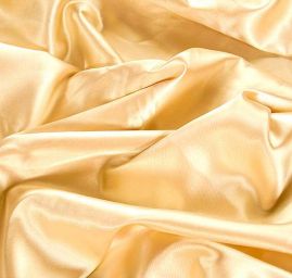 Satén pružný tm. zlatobéžový