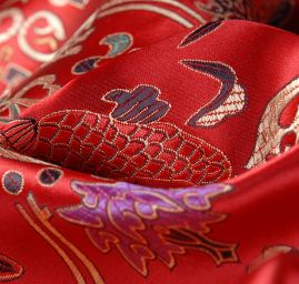 Látka brokát orientální motiv červený