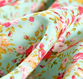 Viskozová letní látka kytičkový motiv tyrkysová