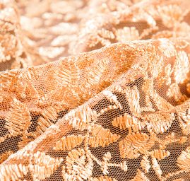 Krajka výšvika na tylu drobný květinový motiv meruňková