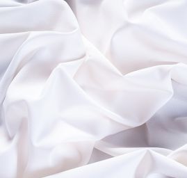 Kostýmová krepová látka vo farbe slonvé kosti