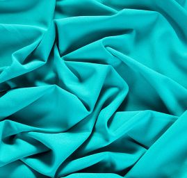 Kostýmová krepová látka tyrkysová
