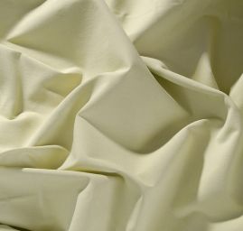 Bavlněná pružná látka světle zelená