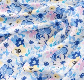 Viskozová šatová látka květy louka modrožlutá