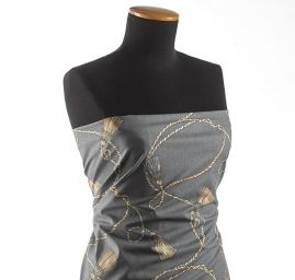 Bavlněná látka se vzorem střapců