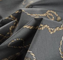 Bavlněná látka se vzorem střapců