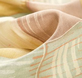 Viskózová letní látka geometrický vzor pastel zelená