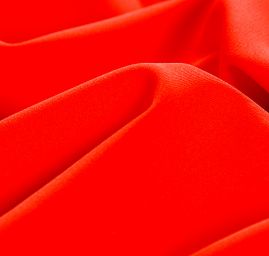 Kostýmová letní látka pastel červená