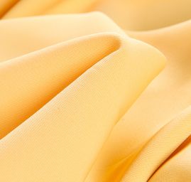 Kostýmová letní látka pastel žlutá