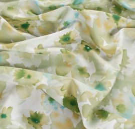 Viskozová šatová látka rozpité květy zelená