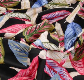 Viskozová šatová látka listy černá