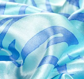 Satén nepružný zvířecí motiv modrý