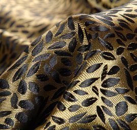 Brokát drobné lístečky zlatočerný