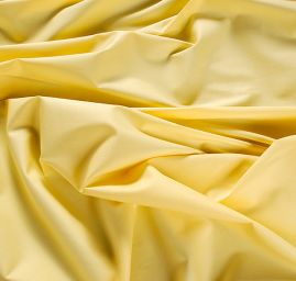 Pružná bavlněná látka pastel žlutá II.jakost