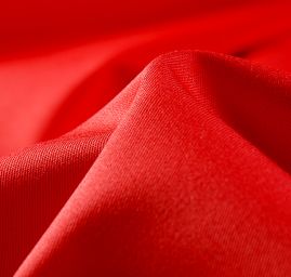 Pružná bavlněná látka jasně červená