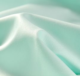 Pružná bavlněná látka pastel pistácie