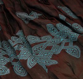 Taft kupón výšivka tvarovaný kraj hnědotyrkysová