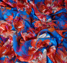 Hedvábný šifon květinový motiv oranžovomodrý