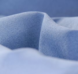 Riflovina pružná batika světle/tmavě modrá