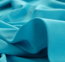 Pletenina jemná tyrkysové barvy