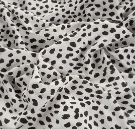 Viskozová šatová látka zvířecí vzor bíločerná