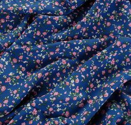 Viskozová šatová látka drobné kytičky modrá