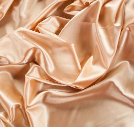 Satén pružný jemný zlatobéžové barvy  II.jakost