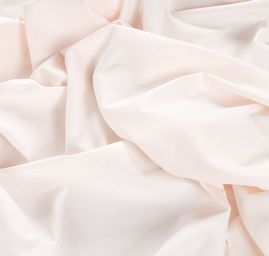 Bavlněná pružná látka smetanová