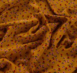 Viskozová šatová látka drobné květy okrová