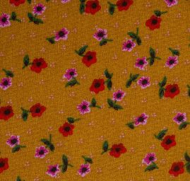 Viskozová šatová látka drobné květy okrová