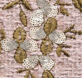 Kostýmová látka s flitrovou výšivkou květů
