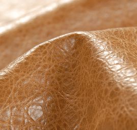 Pravá useň kozina s hrubší kresbou líce hnědá