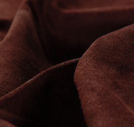 Pravá useň jehnětina semiš tm. hnědá