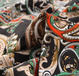 Viskozová šatová látka paisley vzor černá oranžová
