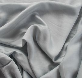 Lamé šatová látka stříbrnošedá světlá