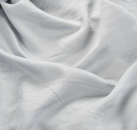 Lamé šatová látka stříbrnošedá světlá