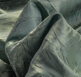 Lamé šatová látka zelenomodrá